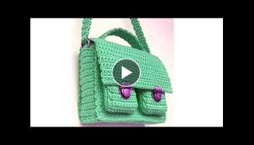 Crochet bag with zipper and flap, two outer pockets