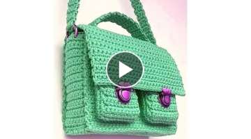 Crochet bag with zipper and flap, two outer pockets